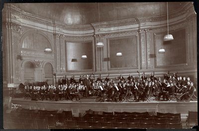 Full orchestra on stage, New York by Byron Company